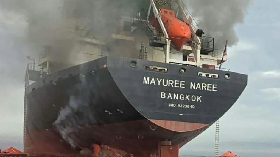 A Thai vessel, the Mayuree Naree, caught fire after being hit by an unidentified projectile in the Strait of Hormuz