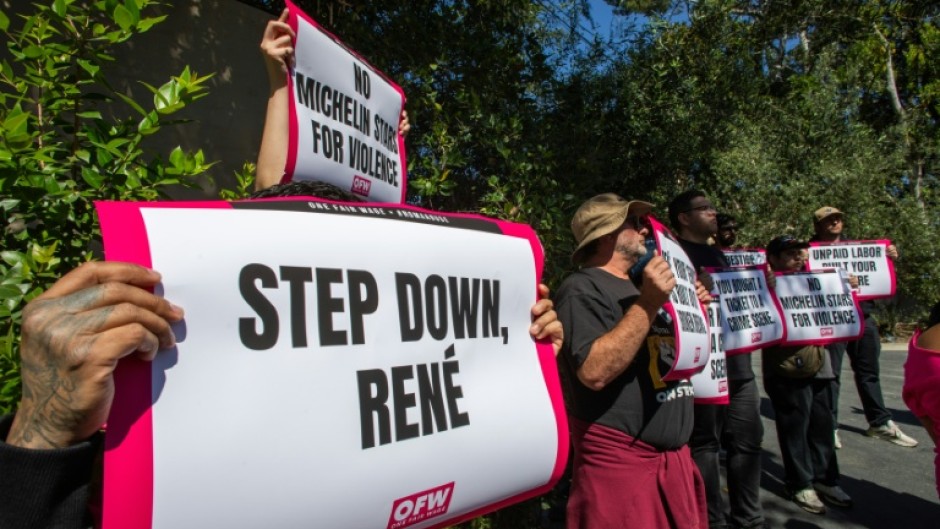 Activists and restaurant workers gather in front of Danish chef Rene Redzepi's Noma Restaurant's $1,500-per-seat pop-up in Los Angeles, on March 11, 2026
