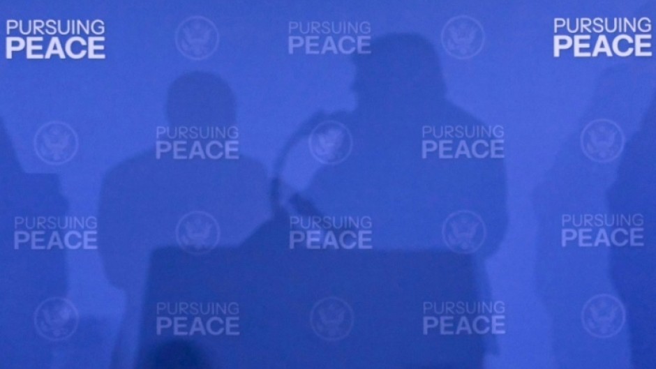 The shadows of US President Donald Trump and Russian President Vladimir Putin seen at their 2025 summit in Anchorage