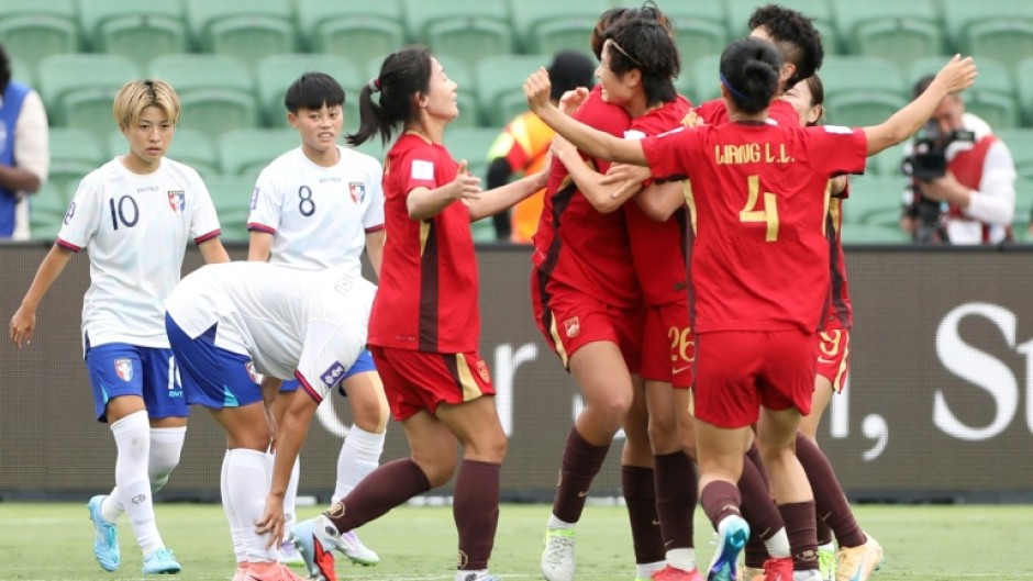 China players celebrate a goal by Shao Ziqin during the AFC Women's Asian Cup quarter-final against Taiwan