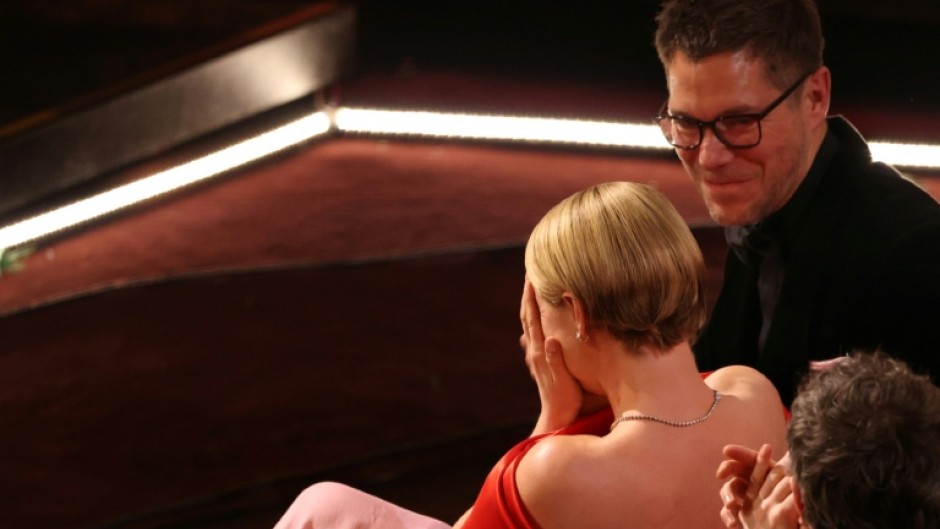 Jessie Buckley, sitting next to her husband Freddie Sorensen, was overwhelmed with emotion when the award was announced