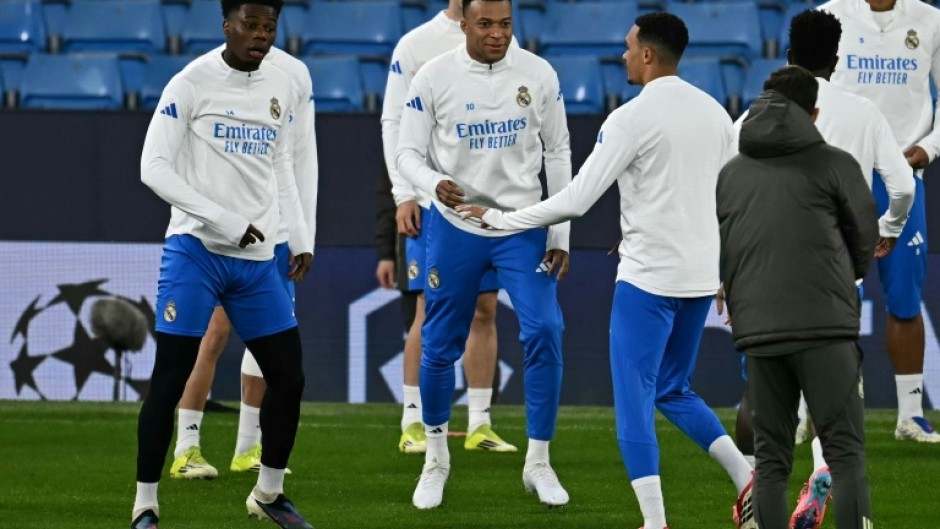 Real Madrid's Kylian Mbappe (C) is set to return to action against Manchester City