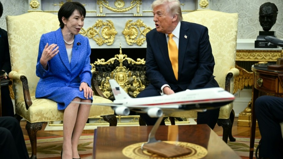 US President Donald Trump with Japan's Prime Minister Sanae Takaichi in the Oval Office