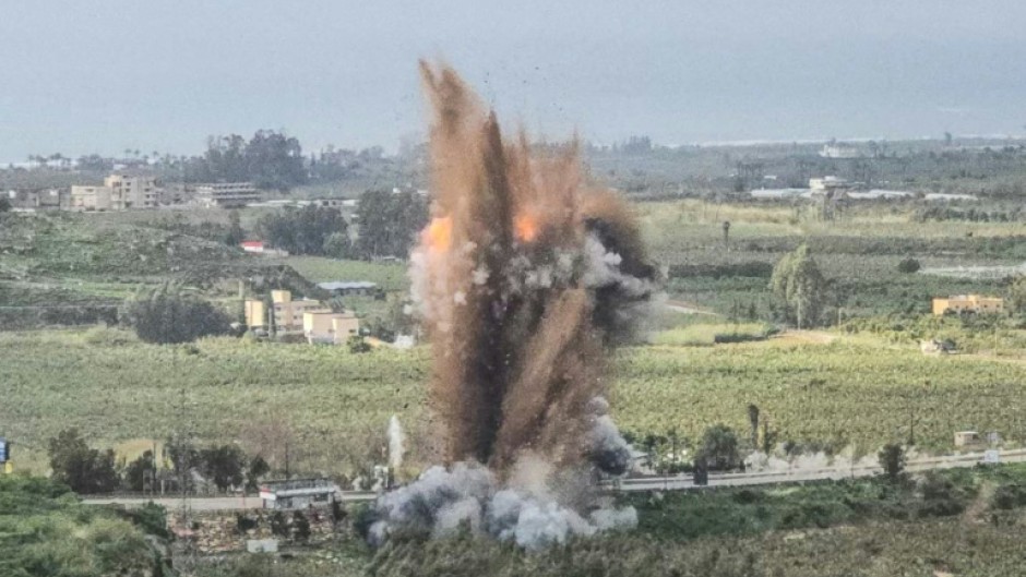 Smoke rises from an Israeli airstrike on the Qasmiyeh bridge in south Lebanon