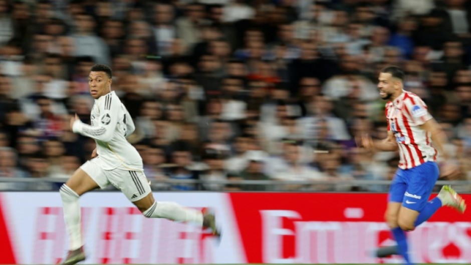 French great Kylian Mbappe (L) says he felt anger and anxiety over a knee injury that is now behind him