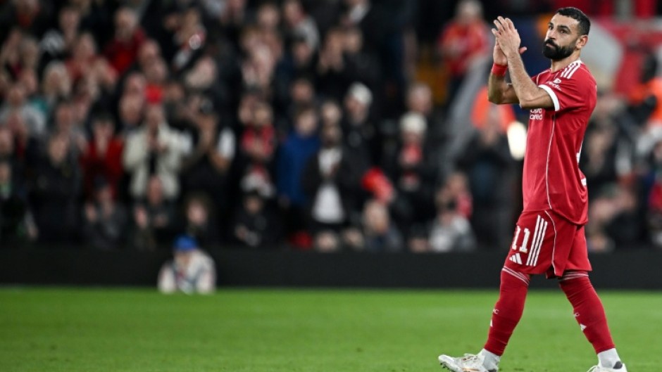 Mohamed Salah applauds as he leaves the pitch after being substituted during Liverpool's Champions League match against Galatasaray