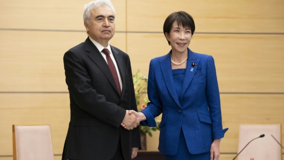 Japan's Prime Minister Sanae Takaichi and Executive Director of the International Energy Agency (IEA) Fatih Birol