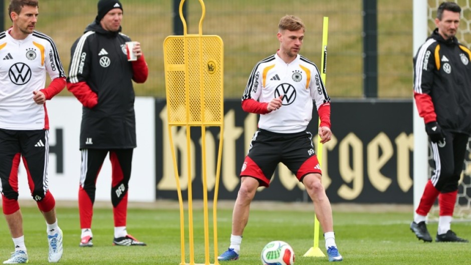 German captain Joshua Kimmich (C) said that a strong Bayern Munich contingent helps the national team