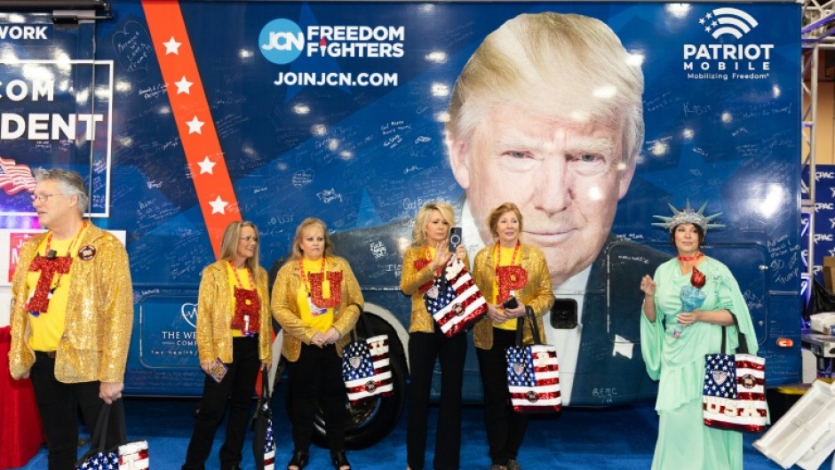 Attendees wear shirts spelling out “TRUMP” during the Conservative Political Action Conference at the Gaylord Texan Resort & Convention Center, in Grapevine, Texas