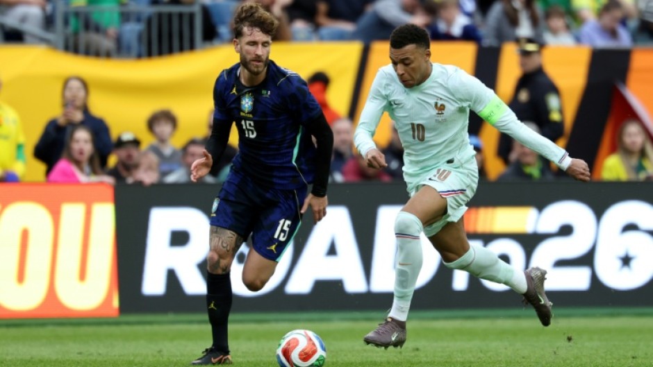 Kylian Mbappe (R) in action for France in Thursday's friendly win over Brazil in the United States