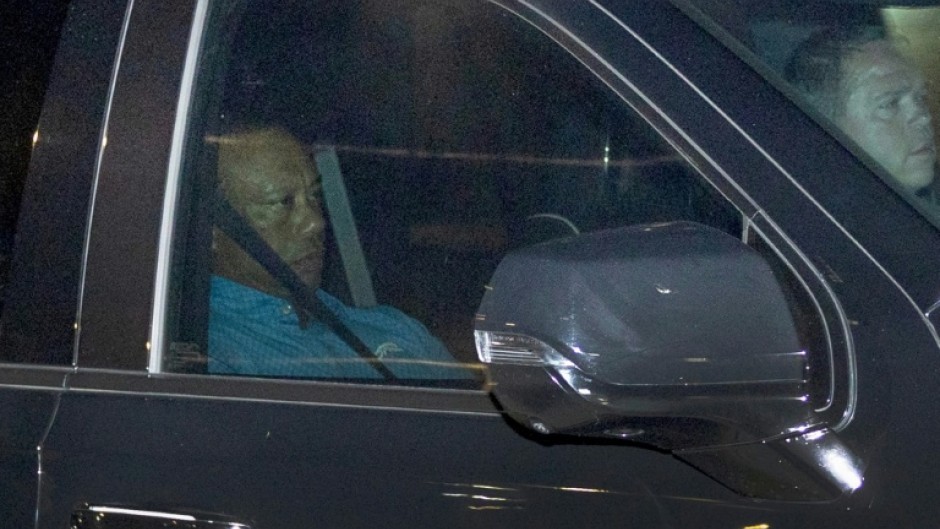 Tiger Woods leaving the Martin County jail in Florida after being arrested on charges of driving under the influence after a car crash