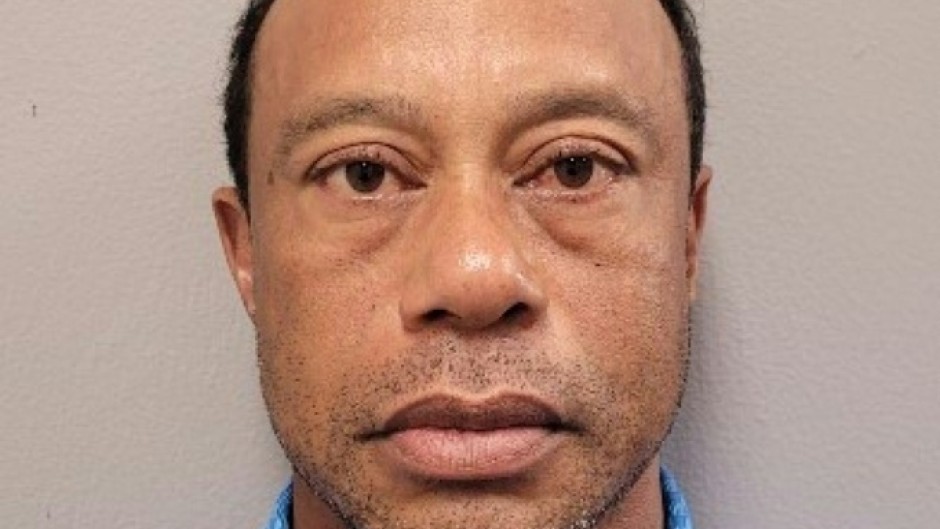 This handout booking photo shows golf superstar Tiger Woods after his arrest on suspicion of driving under the influence after a car crash in Florida