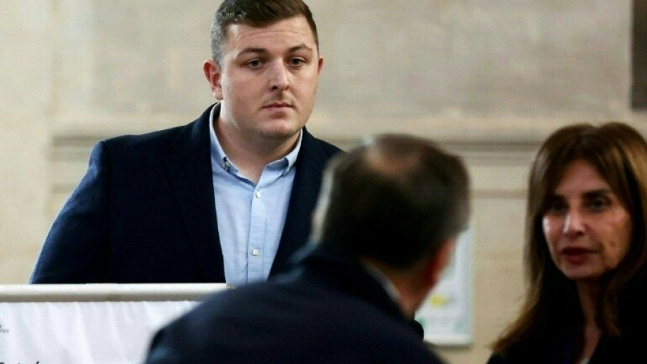 Former Irish rugby player Denis Coulson (L) in court before his trial for rape in Bordeaux in 2024