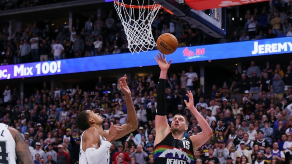 Denver's Nikola Jokic scores against Victor Wembanyama in the Nuggets' NBA overtime win over the San Antonio Spurs