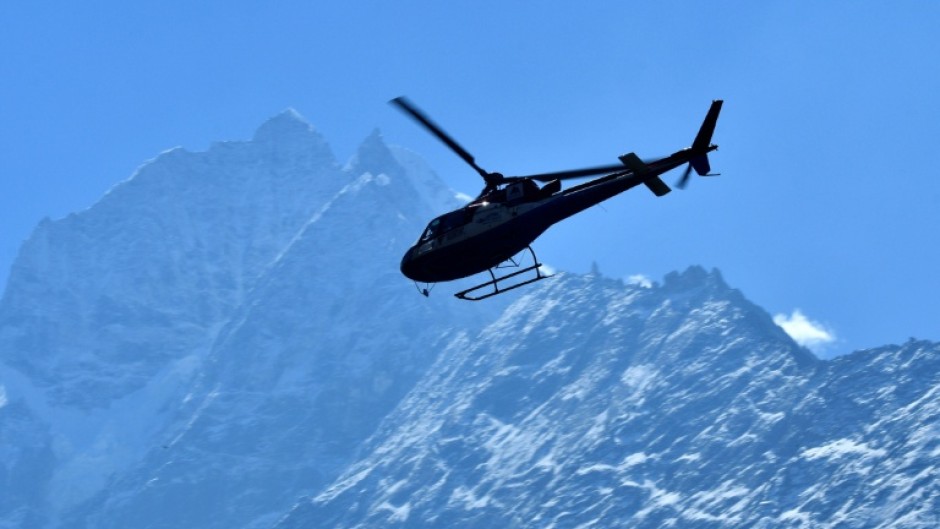Nepal, home to eight of the world's 10 highest peaks including Everest, attracts thousands of trekkers each year, many walking remote high-altitude trails where emergency airlifts are costly
