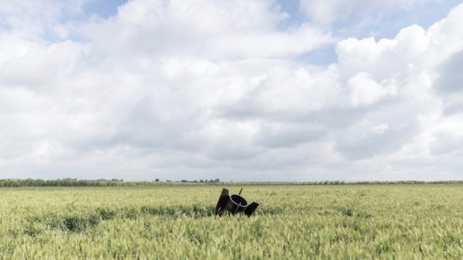 Remnants of an Iranian missile are seen near the border between the Israeli-annexed Golan Heights and Syria