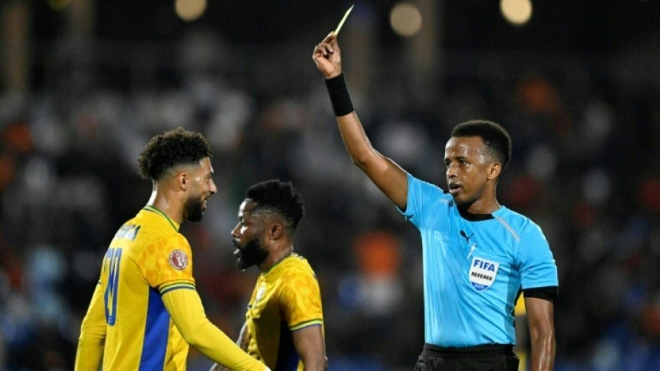 Somalia referee Omar Artan (R) will officiate at the 2026 World Cup finals