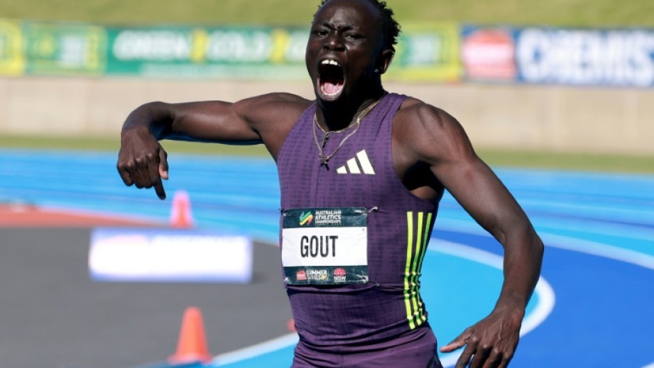 Gout Gout celebrates winning the 200m in 19.67 seconds at the Australian Athletics Championships in Sydney