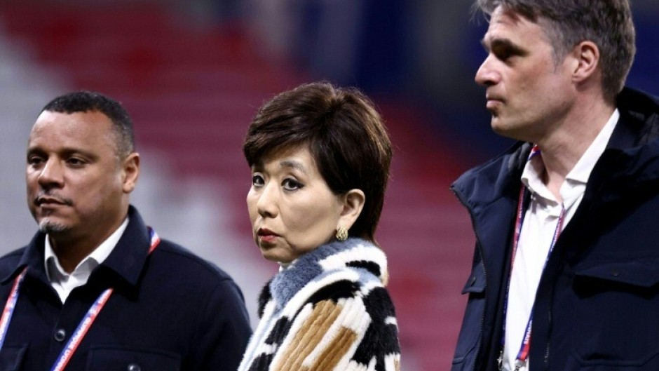 Lyon's technical director Matthieu Louis-Jean (L), US businesswoman and club president Michele Kang (C) and the French club's general manager Michael Gerlinger (R) at a Ligue 1 match against Paris FC on March 8, 2026
