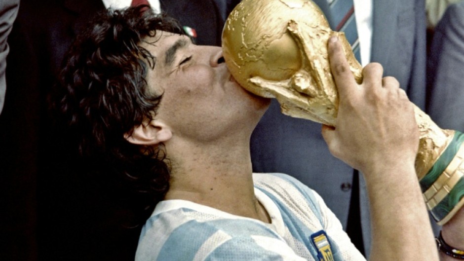 Argentina is holding a new trial over the death of football legend Diego Maradona, seen here kissing the FIFA World Cup in 1986 after Argentina's victory of West Germany in the final