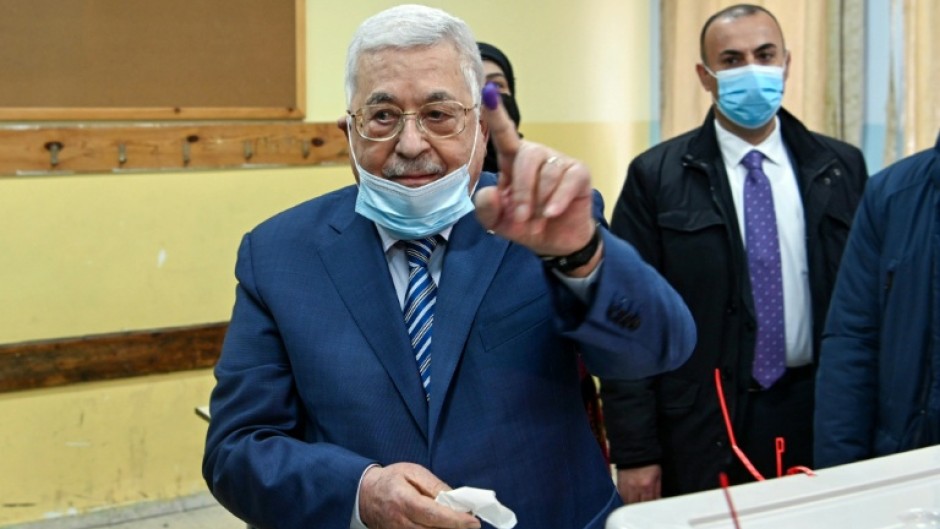 Mahmud Abbas, seen here voting in local elections in 2022, was elected as Palestinian president for a four-year term in 2005