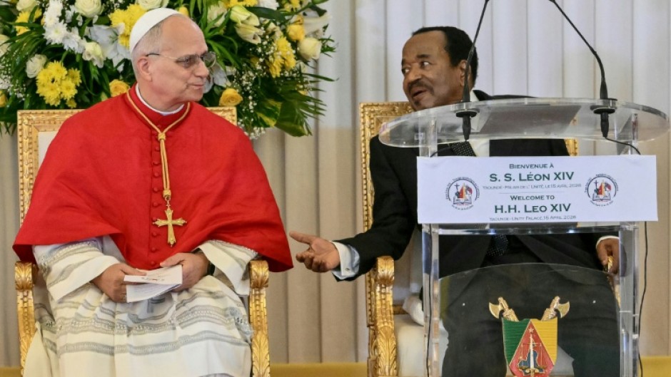 Pope Leo XIV urged an end to the conflict in a pointed speech next to Cameroon's President Paul Biya (R)