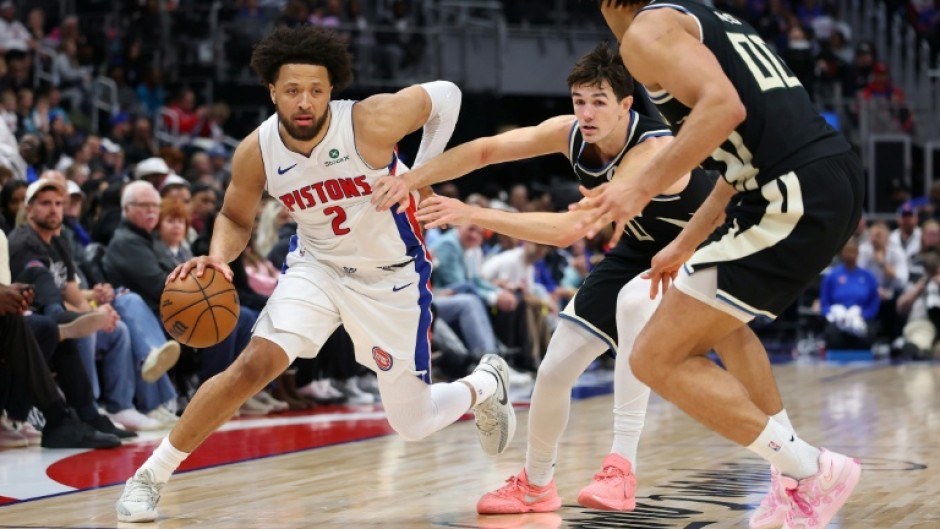 Cade Cunningham of the Detroit Pistons drives during an NBA game against the Milwaukee Bucks