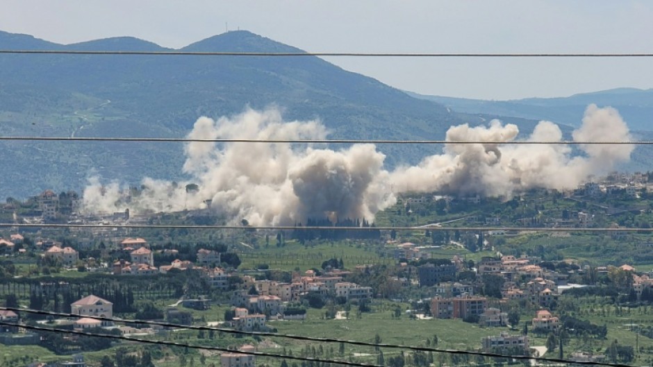 Smoke billows from explosions in the southern Lebanese village of Khiam, where the Israeli army has demolished residents' homes