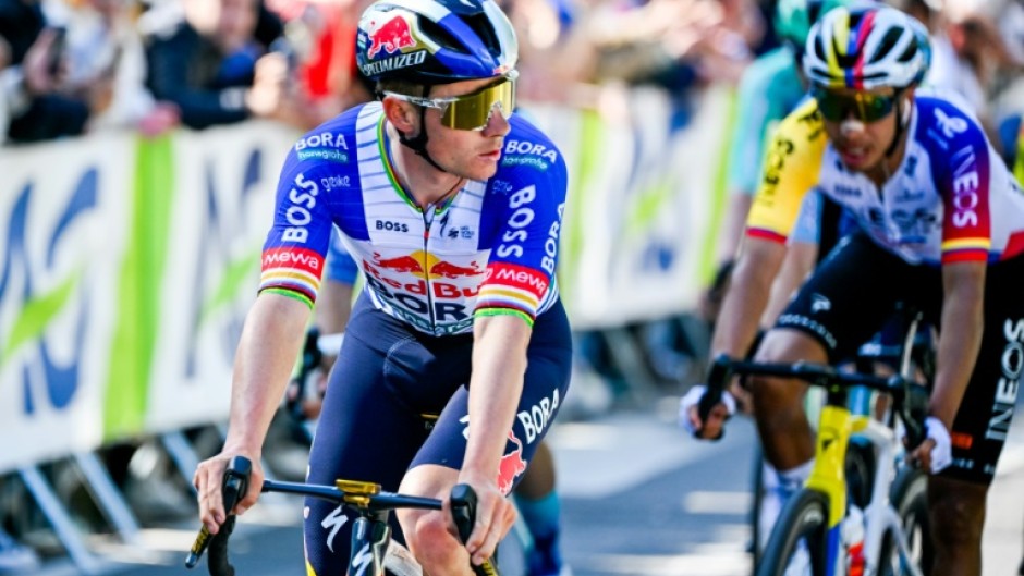 Olympic champion Remco Evenepoel (L) tipped his hat to Paul Seixas, 'one of the best climbers in the world'