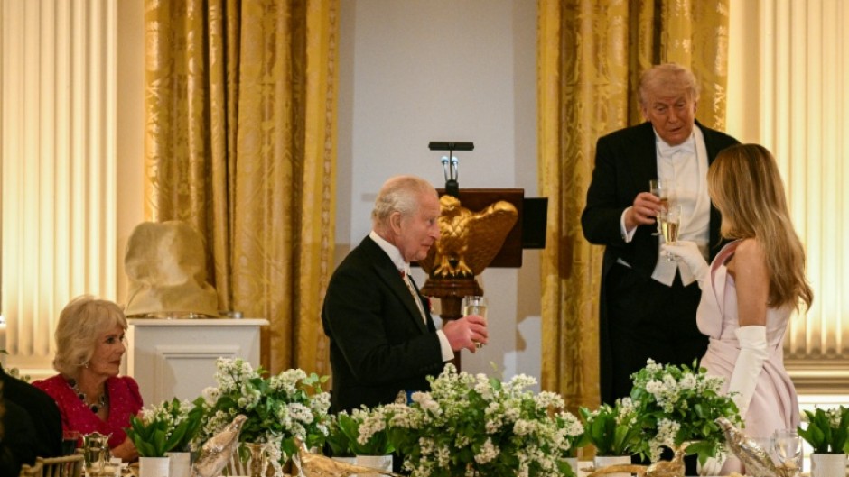 Britain's King Charles III shared a toast with US President Donald Trump and First Lady Melania Trump as Queen Camilla looks on during a State Dinner in the East Room of the White House
