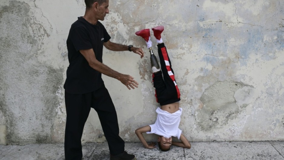 Cuban 10-year-old Juan Jose Guilarte, who was born with a congenital malformation that saw his left leg develop only to the kneecap, dreams of becoming an Olympian