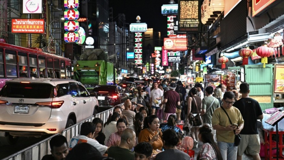The crowded, bustling sidewalks and the smell of freshly grilled squid and other street treats are for many visitors a key part of Bangkok's charm