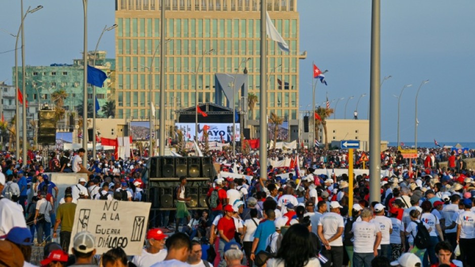 Thousands attended marches in Havana and other Cuban cities, vowing to 'defend the homeland'