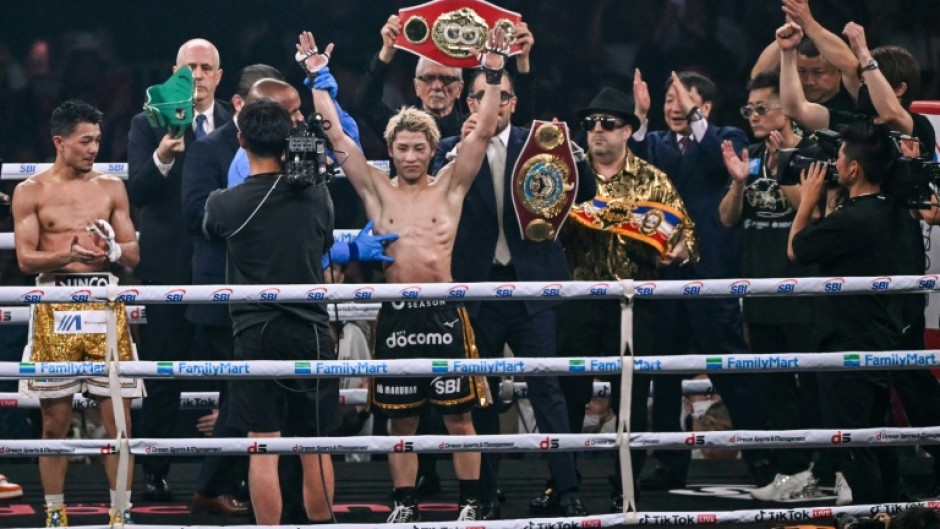 Japan's Naoya Inoue defeated Junto Nakatani by unanimous decision in their championship boxing bout to retain his undisputed super bantamweight titles at the Tokyo Dome
