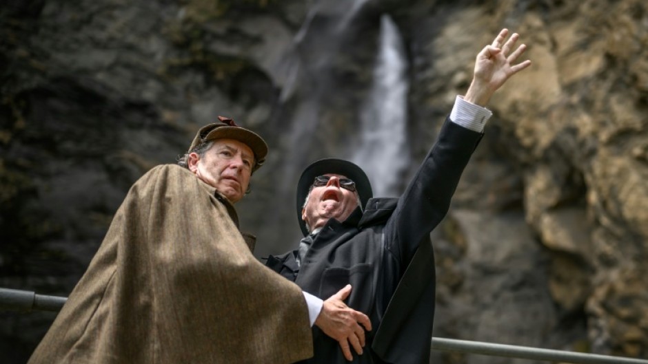Reichenbach reenacted: Sherlock Holmes, here played by British motoring author Philip Porter, grapples with nemesis Professor Moriarty, played by British lawyer Peter Horrocks