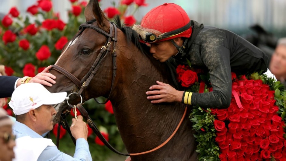 Jockey Jose Ortiz celebrates his Kentucky Derby victory aboard Golden Tempo