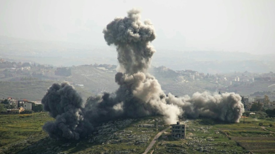 Smoke rises from the site of an Israeli airstrike that targeted the southern Lebanese village of Deir El Zahrani