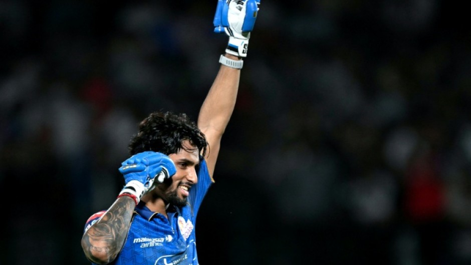 Tilak Varma celebrates after powering Mumbai Indians to victory over Punjab Kings.