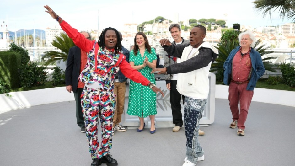 Director and screenwriter Rafiki Fariala poses with French producer Caroline Nataf, French film producer Boris Lojkine, Fariala protege Bradley Fiomona Dembeasset and Chilean Director Marco Bechis