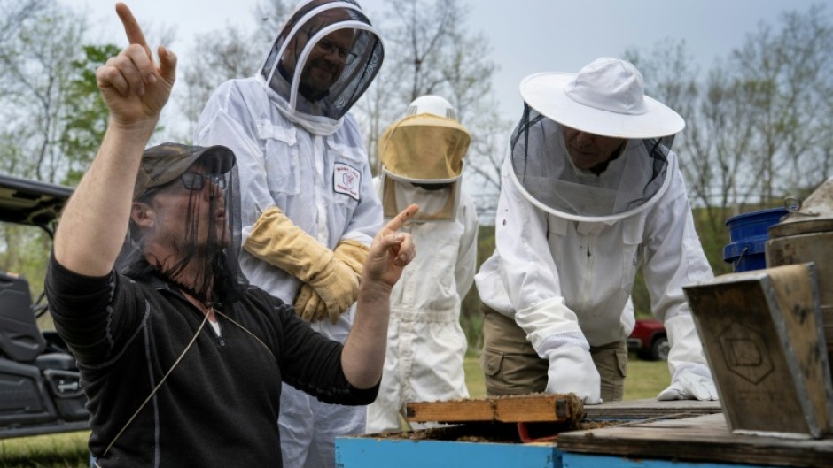 Bee researcher Zac Lamas, left, has taken a job with a local university amid uncertainty about the Beltsville bee lab's future