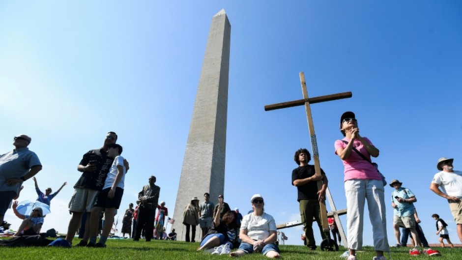Christian worshippers gathered in the shadow of the Washington Monument for a weekend 'National Jubilee of Prayer' in the nation's capital