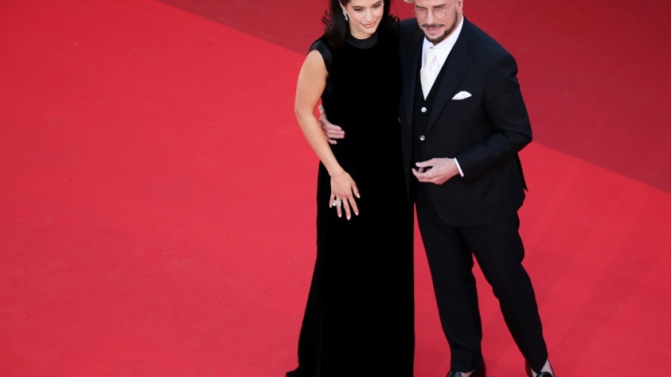 John Travolta (right) with his daughter, actress Ella Bleu Travolta at Cannes