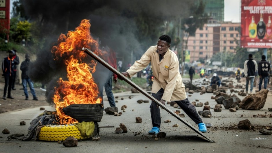 Kenya's public transport system was paralysed when protesters barricaded roads over fuel price hikes