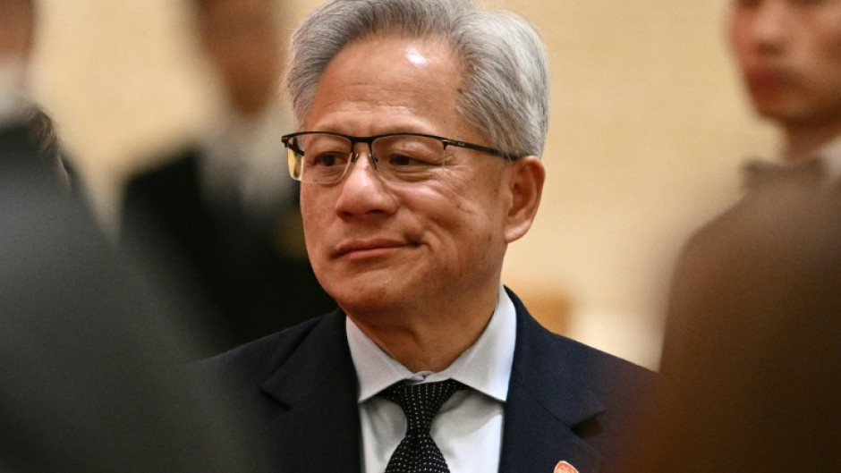 Nvidia founder and CEO Jensen Huang arrives ahead of a state banquet for US President Donald Trump and China's President Xi Jinping at the Great Hall of the People Beijing on May 14, 2026