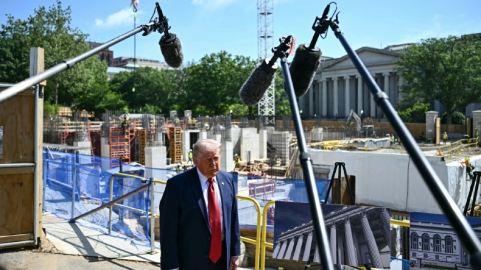 US President Donald Trump speaks to the press near the construction site of his proposed ballroom at the White House in Washington, DC, on May 19, 2026.
