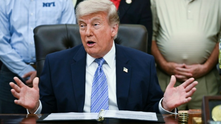 US President Donald Trump speaks during an announcement with Environmental Protection Agency (EPA) Administrator Lee Zeldin in the Oval Office of the White House in Washington, DC on May 21, 2026.