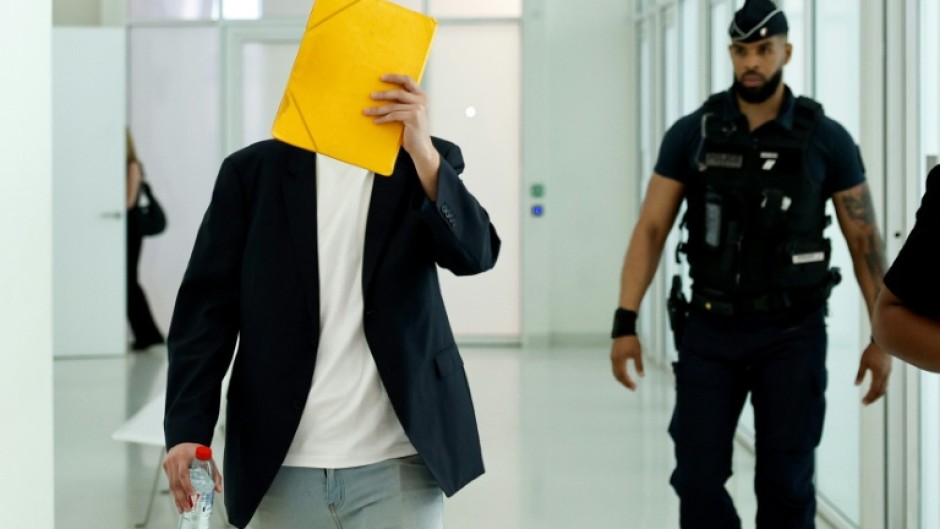 The defendant, a 36-year-old freelance journalist who worked in a kindergarten to help make ends meet, denies the accusations