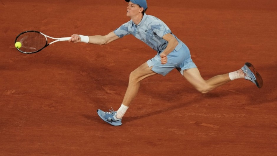 Jannik Sinner plays a forehand to Clement Tabur at the French Open