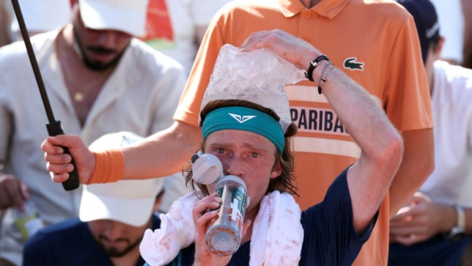 Andrey Rublev used an ice bag to cool off at the French Open on Monday