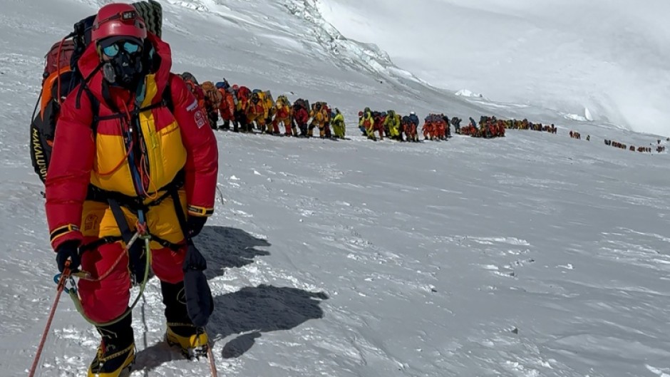 In a single day, an estimated 275 climbers reached the summit of Mount Everest